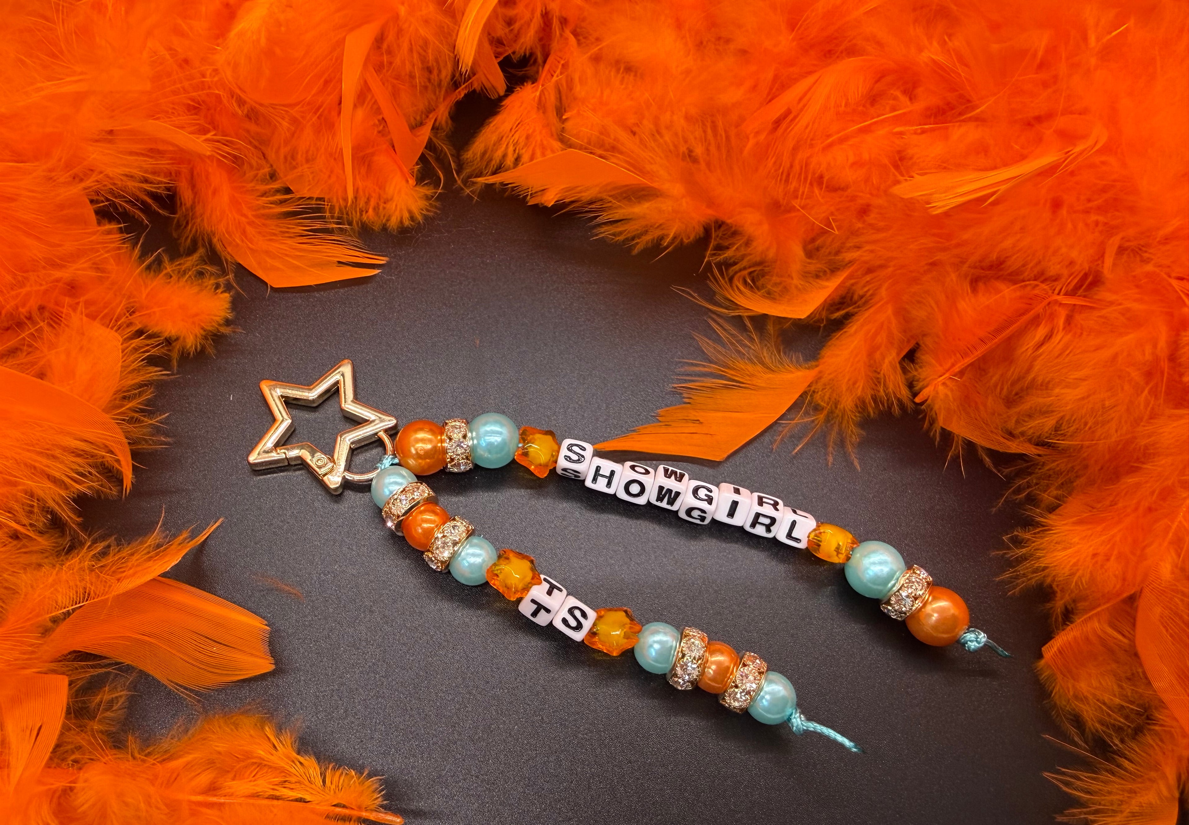 Showgirl bag charm